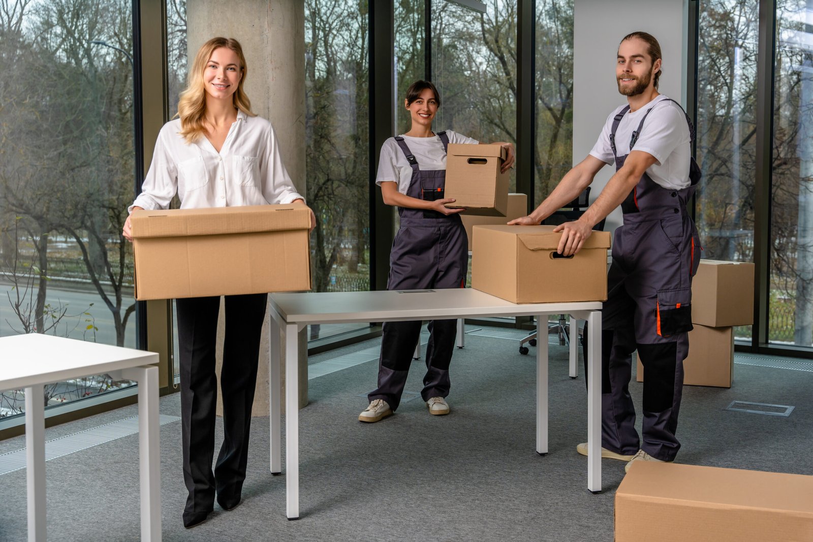 Delivery services. Group of people working in a delivery point
