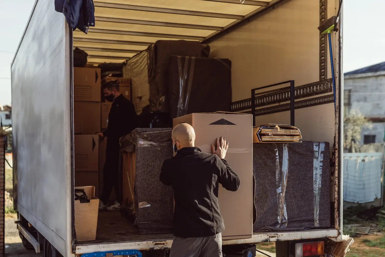 two moving company employee moving stuff